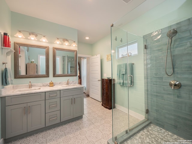 2872 Lakeview Dr, Canyon Lake, TX 78133 - full bathroom featuring a shower stall, double vanity, and tile patterned flooring