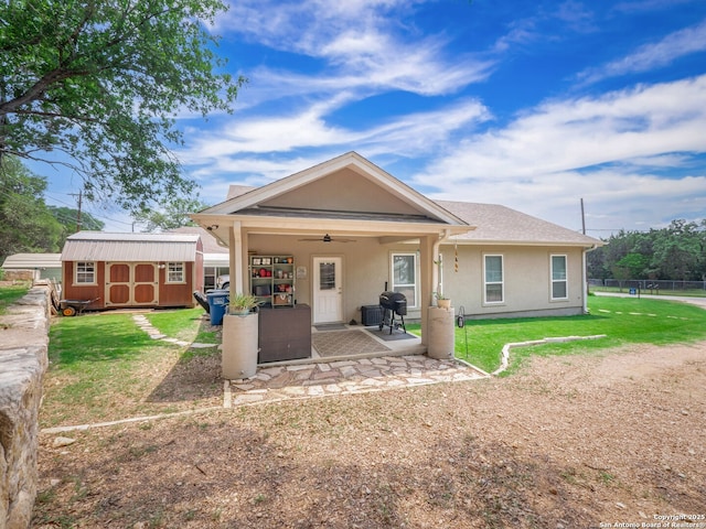 2872 Lakeview Dr, Canyon Lake, TX 78133 - back of house featuring ceiling fan, a patio area, and stucco siding