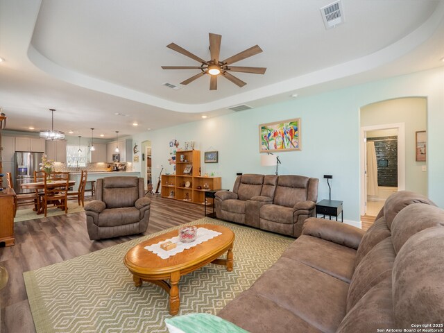 2872 Lakeview Dr, Canyon Lake, TX 78133 - living area featuring ceiling fan, recessed lighting, a raised ceiling, and light wood-style flooring