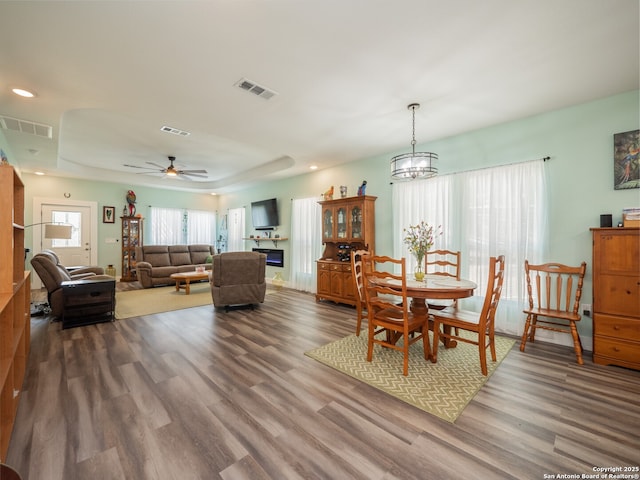 2872 Lakeview Dr, Canyon Lake, TX 78133 - dining area featuring wood finished floors, ceiling fan, a chandelier, and recessed lighting
