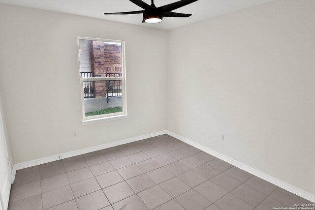8517 Barefoot Ln, Converse, TX 78109 - tiled empty room with a ceiling fan and baseboards