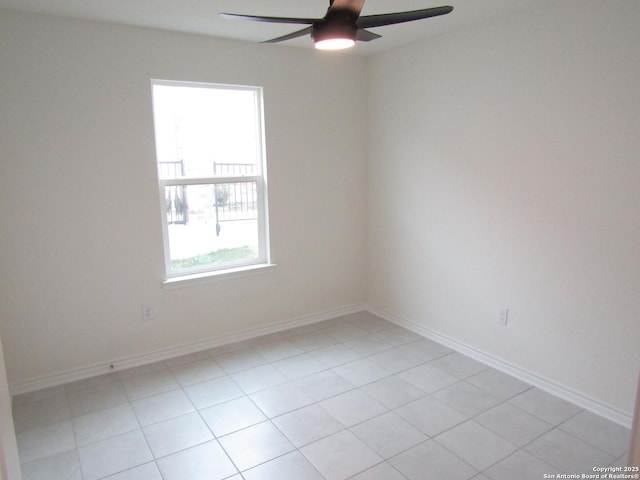 8517 Barefoot Ln, Converse, TX 78109 - empty room featuring ceiling fan, light tile patterned floors, and baseboards