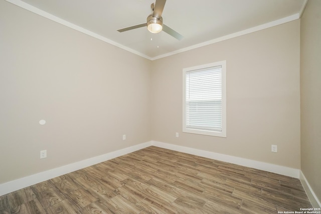 2115 W Houston, San Antonio, TX 78207 - spare room featuring ornamental molding, a ceiling fan, light wood-style flooring, and baseboards