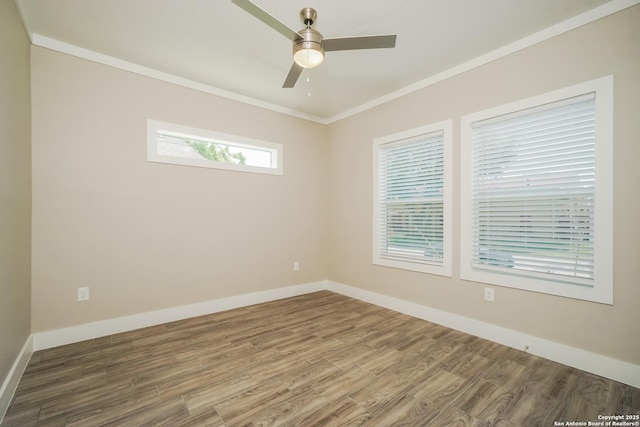 2115 W Houston, San Antonio, TX 78207 - spare room with wood finished floors, crown molding, a ceiling fan, and baseboards
