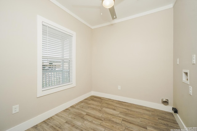 2115 W Houston, San Antonio, TX 78207 - empty room with a ceiling fan, wood finished floors, baseboards, and ornamental molding