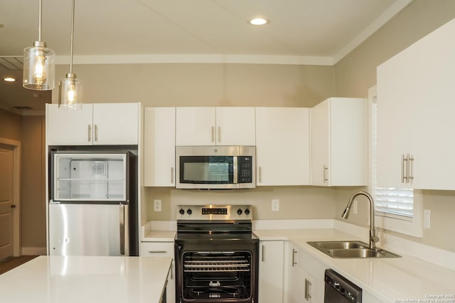 2115 W Houston, San Antonio, TX 78207 - kitchen with appliances with stainless steel finishes, a sink, white cabinets, light countertops, and recessed lighting