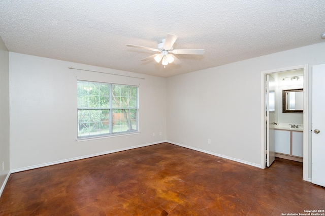 5731 Bypass Trl, San Antonio, TX 78244 - spare room featuring a ceiling fan, a textured ceiling, and baseboards
