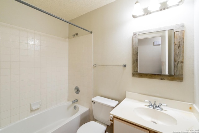 5731 Bypass Trl, San Antonio, TX 78244 - full bath with toilet, vanity,  shower combination, and a textured ceiling