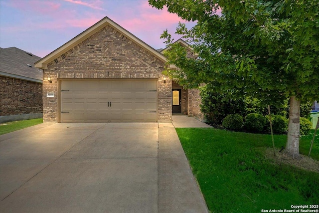 10218 Nate Range, San Antonio, TX 78254 - view of front facade with brick siding, concrete driveway, a garage, and a front yard