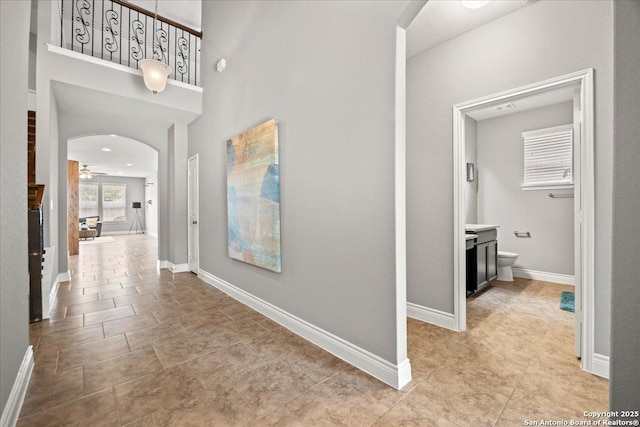 10218 Nate Range, San Antonio, TX 78254 - hallway with arched walkways and baseboards