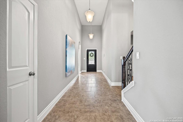 10218 Nate Range, San Antonio, TX 78254 - foyer featuring baseboards and stairs