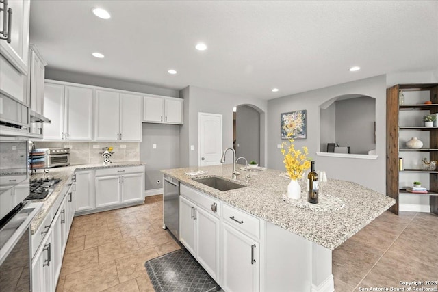 10218 Nate Range, San Antonio, TX 78254 - kitchen featuring a sink, an island with sink, white cabinetry, and recessed lighting