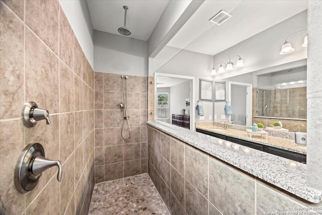 10218 Nate Range, San Antonio, TX 78254 - full bath with a tile shower and vanity