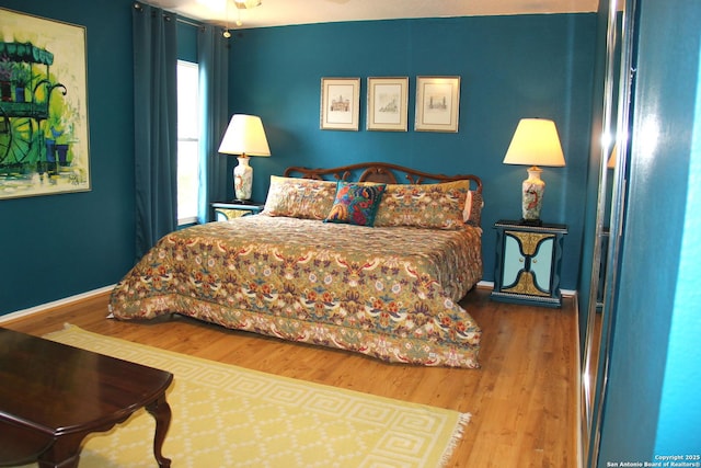 39 Latrobe Post, San Antonio, TX 78240 - bedroom featuring wood finished floors and baseboards