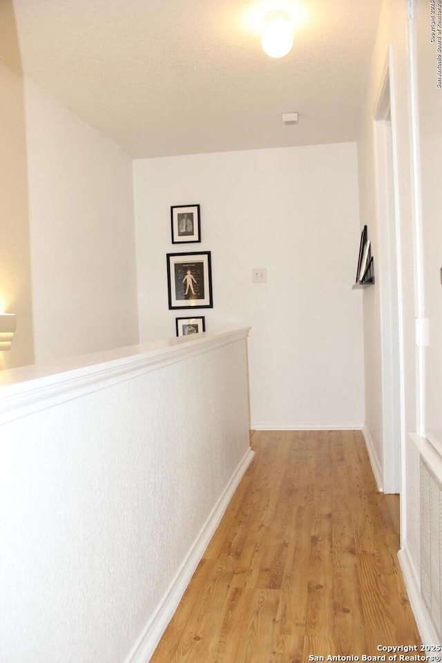 39 Latrobe Post, San Antonio, TX 78240 - hallway featuring light wood-style flooring and baseboards