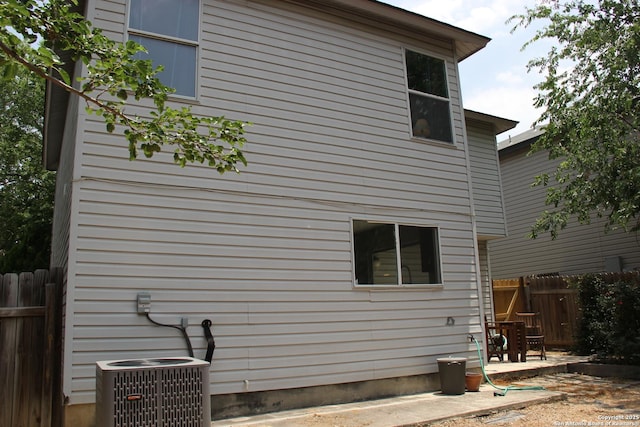 39 Latrobe Post, San Antonio, TX 78240 - back of house with central AC and a patio area