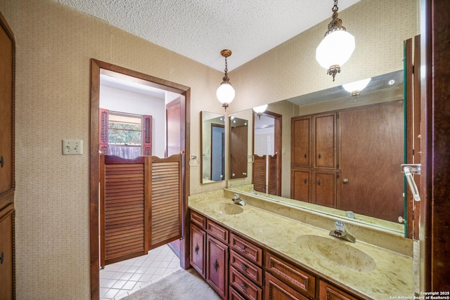 402 Waycrest, Windcrest, TX 78239 - full bathroom with double vanity, tile patterned floors, and a textured ceiling