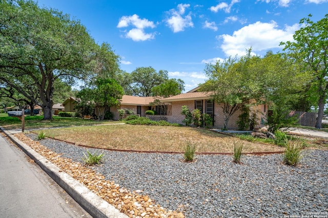 402 Waycrest, Windcrest, TX 78239 - single story home featuring brick siding and an attached garage