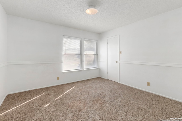 8131 Talkenhorn, Converse, TX 78109 - unfurnished room featuring carpet floors, a textured ceiling, and baseboards