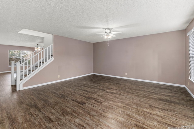 8131 Talkenhorn, Converse, TX 78109 - empty room featuring a ceiling fan, wood finished floors, stairs, a textured ceiling, and baseboards