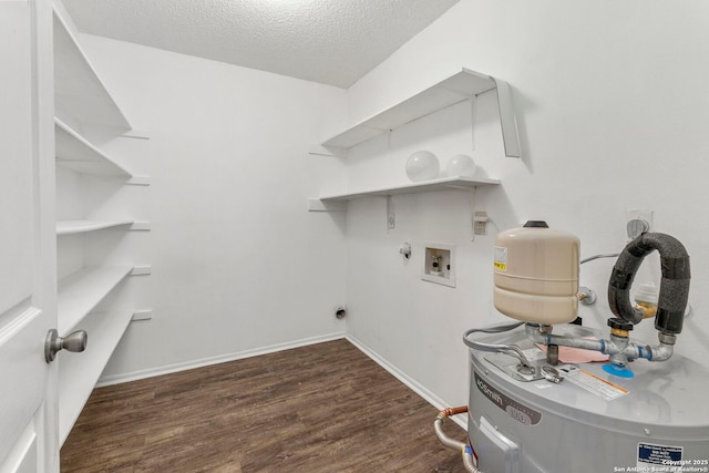 8131 Talkenhorn, Converse, TX 78109 - washroom with hookup for a washing machine, wood finished floors, hookup for an electric dryer, a textured ceiling, and baseboards