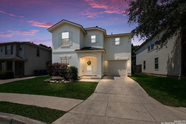 135 Agency Oaks, San Antonio, TX 78249 - traditional-style home featuring stucco siding, a garage, driveway, and a front lawn