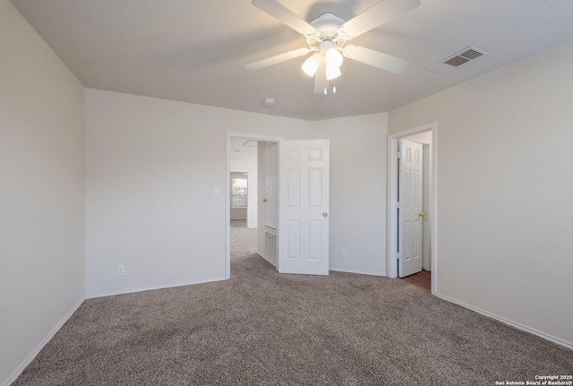 135 Agency Oaks, San Antonio, TX 78249 - unfurnished bedroom featuring carpet flooring, baseboards, and ceiling fan