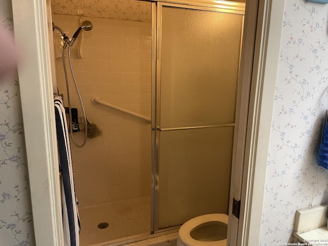 6823 S Whitland, San Antonio, TX 78239 - full bath with a stall shower, toilet, and wallpapered walls