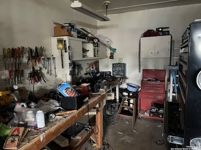 6823 S Whitland, San Antonio, TX 78239 - miscellaneous room with a workshop area and unfinished concrete floors