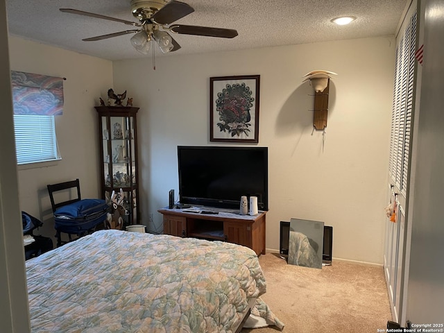 6823 S Whitland, San Antonio, TX 78239 - carpeted bedroom featuring a textured ceiling and ceiling fan