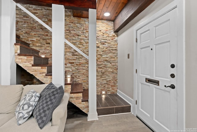 1170 Garraty Rd Unit 14, San Antonio, TX 78209 - foyer entrance with wood finished floors, wooden ceiling, and baseboards