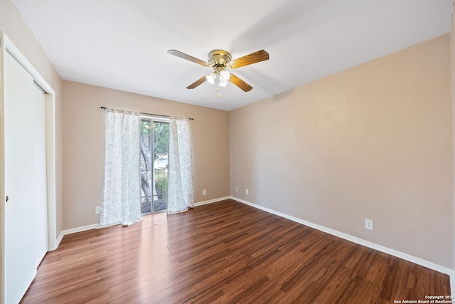 9419 Powhatan Unit 504, San Antonio, TX 78230 - empty room featuring ceiling fan, wood finished floors, and baseboards