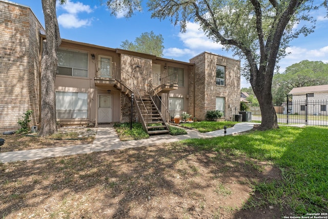 9419 Powhatan Unit 504, San Antonio, TX 78230 - view of property with stairway and central air condition unit