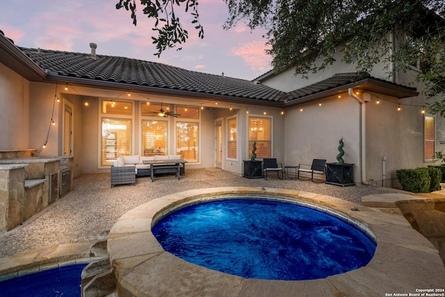 24227 Vecchio, San Antonio, TX 78260 - pool at dusk featuring outdoor lounge area, a patio, an outdoor pool, and ceiling fan