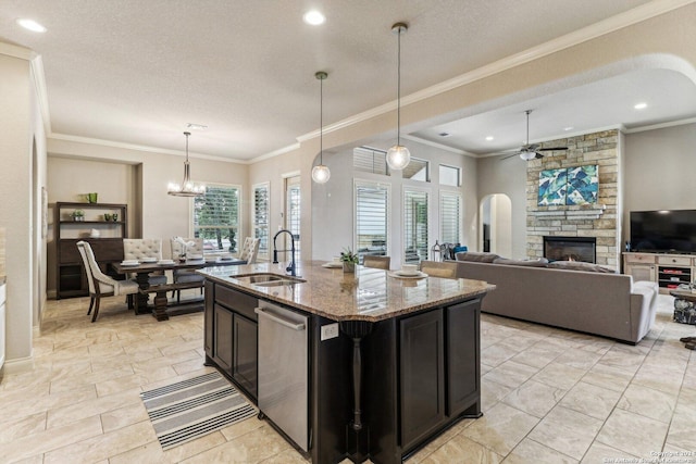 24227 Vecchio, San Antonio, TX 78260 - kitchen with a sink, dishwasher, ceiling fan, stone countertops, and a fireplace