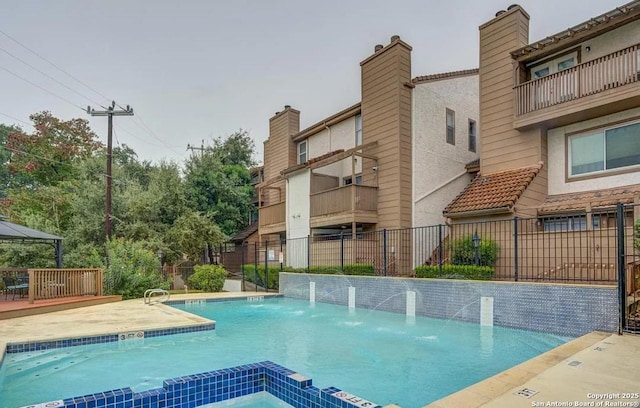 4107 Medical Dr Unit 2204, San Antonio, TX 78229 - view of pool with a pool with connected hot tub and a gazebo