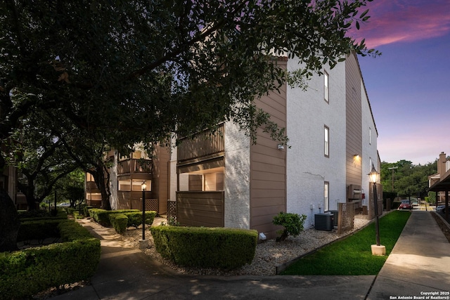 4107 Medical Dr Unit 2204, San Antonio, TX 78229 - property exterior at dusk featuring central AC