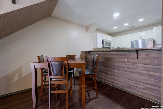 4107 Medical Dr Unit 2204, San Antonio, TX 78229 - dining area with dark wood finished floors and recessed lighting