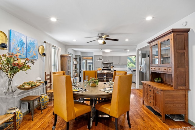 221 Calumet, San Antonio, TX 78209 - dining room featuring light wood-type flooring, ceiling fan, and recessed lighting