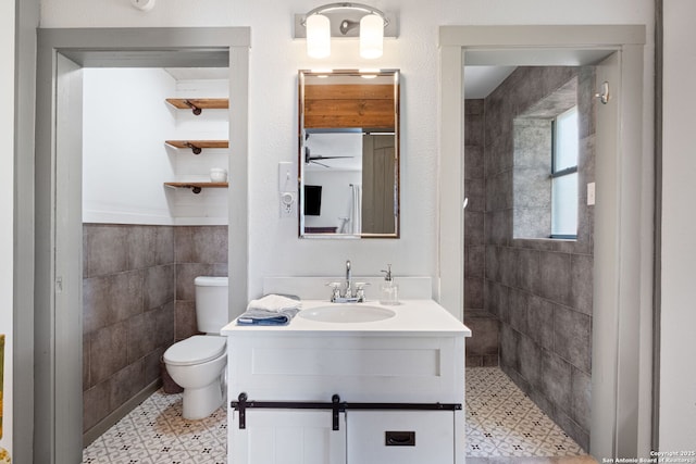 221 Calumet, San Antonio, TX 78209 - full bath with toilet, vanity, walk in shower, and tile patterned floors
