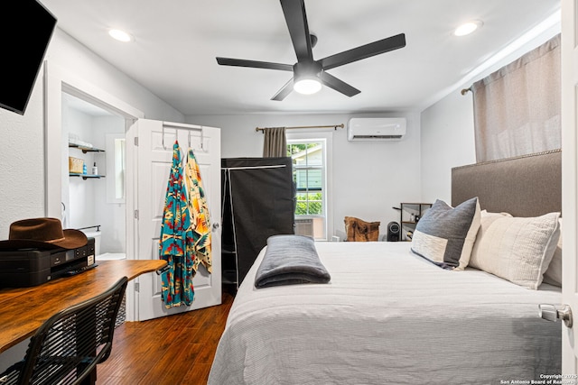 221 Calumet, San Antonio, TX 78209 - bedroom with a wall mounted air conditioner, wood finished floors, a ceiling fan, and recessed lighting