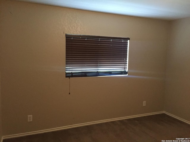 10047 Powderhouse Dr, San Antonio, TX 78239 - unfurnished room with baseboards and carpet