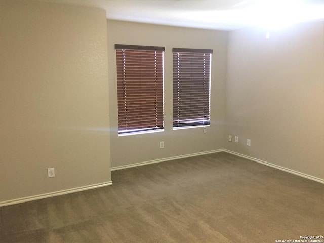 10047 Powderhouse Dr, San Antonio, TX 78239 - empty room featuring carpet flooring and baseboards