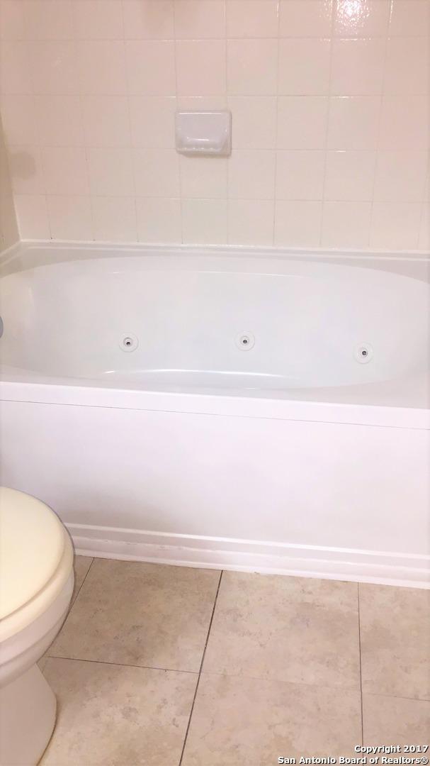10047 Powderhouse Dr, San Antonio, TX 78239 - full bath featuring tile patterned flooring and toilet