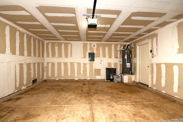 10047 Powderhouse Dr, San Antonio, TX 78239 - garage featuring water heater, a garage door opener, and electric panel