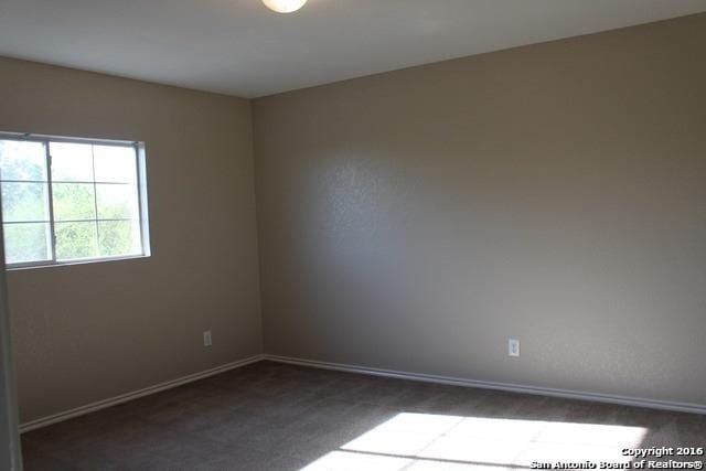 10047 Powderhouse Dr, San Antonio, TX 78239 - carpeted spare room with baseboards