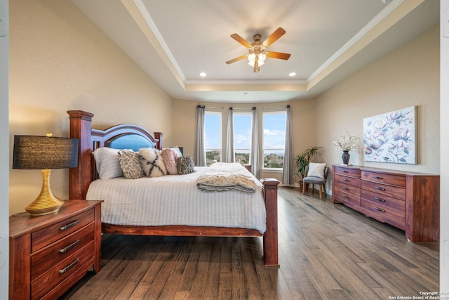 3122 Running Fawn, San Antonio, TX 78261 - bedroom featuring a tray ceiling, dark wood-style flooring, crown molding, recessed lighting, and ceiling fan