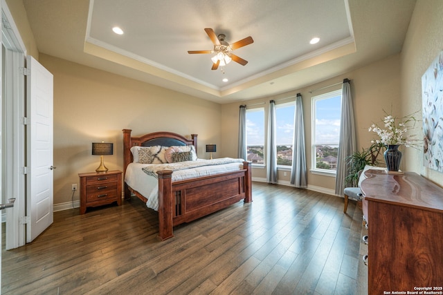 3122 Running Fawn, San Antonio, TX 78261 - bedroom featuring a tray ceiling, dark wood-type flooring, baseboards, crown molding, and recessed lighting