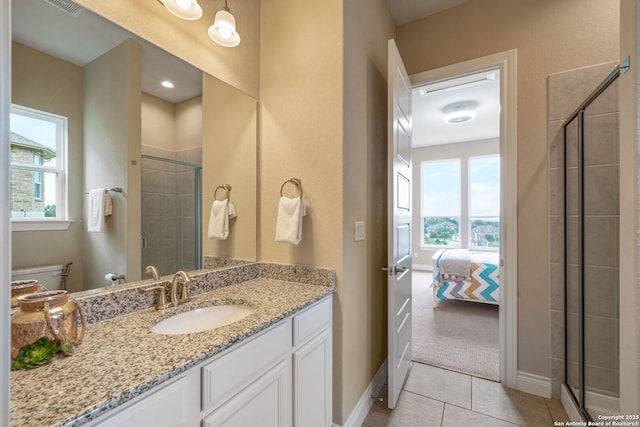 3122 Running Fawn, San Antonio, TX 78261 - bathroom featuring toilet, vanity, a stall shower, and healthy amount of natural light