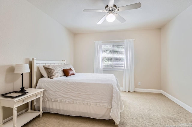 12424 Andice, Helotes, TX 78023 - bedroom with light carpet, baseboards, and ceiling fan